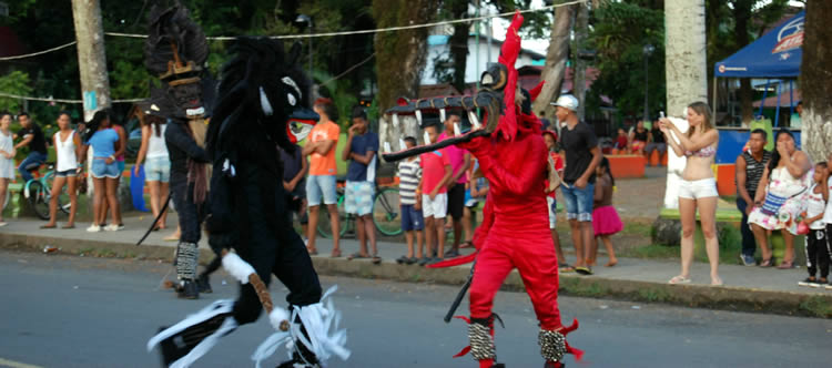 Diablos on Main Street of Bocas Town during Carnivals